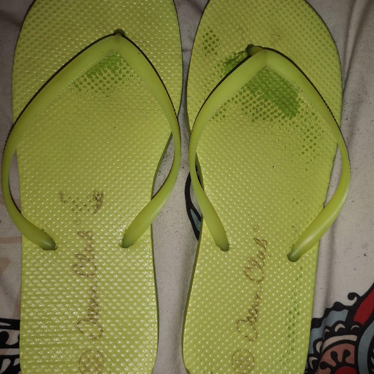 neon yellow flip flops