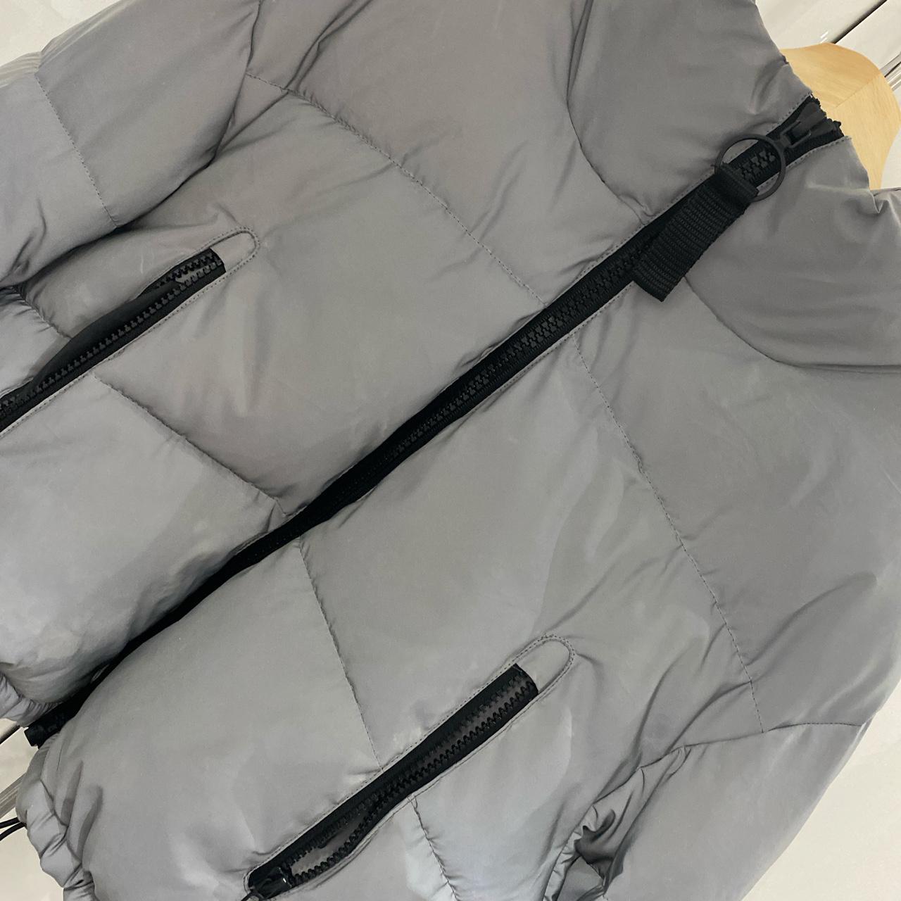 URBAN OUTFITTERS reflective cropped puffer... - Depop