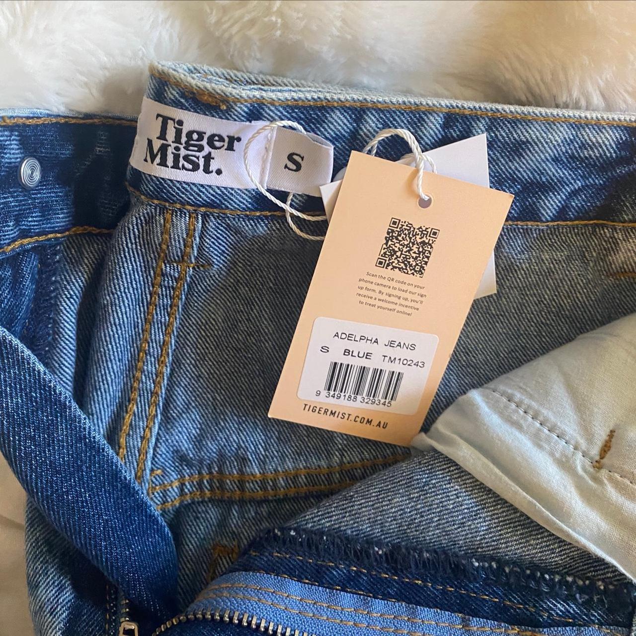 Tiger Mist jeans! Long leg. Slit at the bottom; high… - Depop