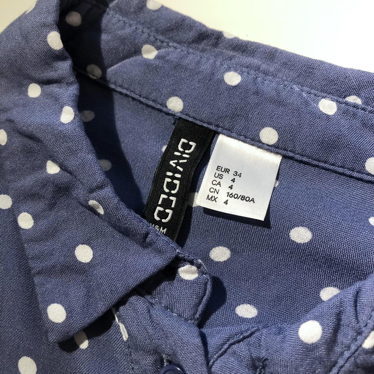 Blue and white polka dot button down shirt with long... - Depop