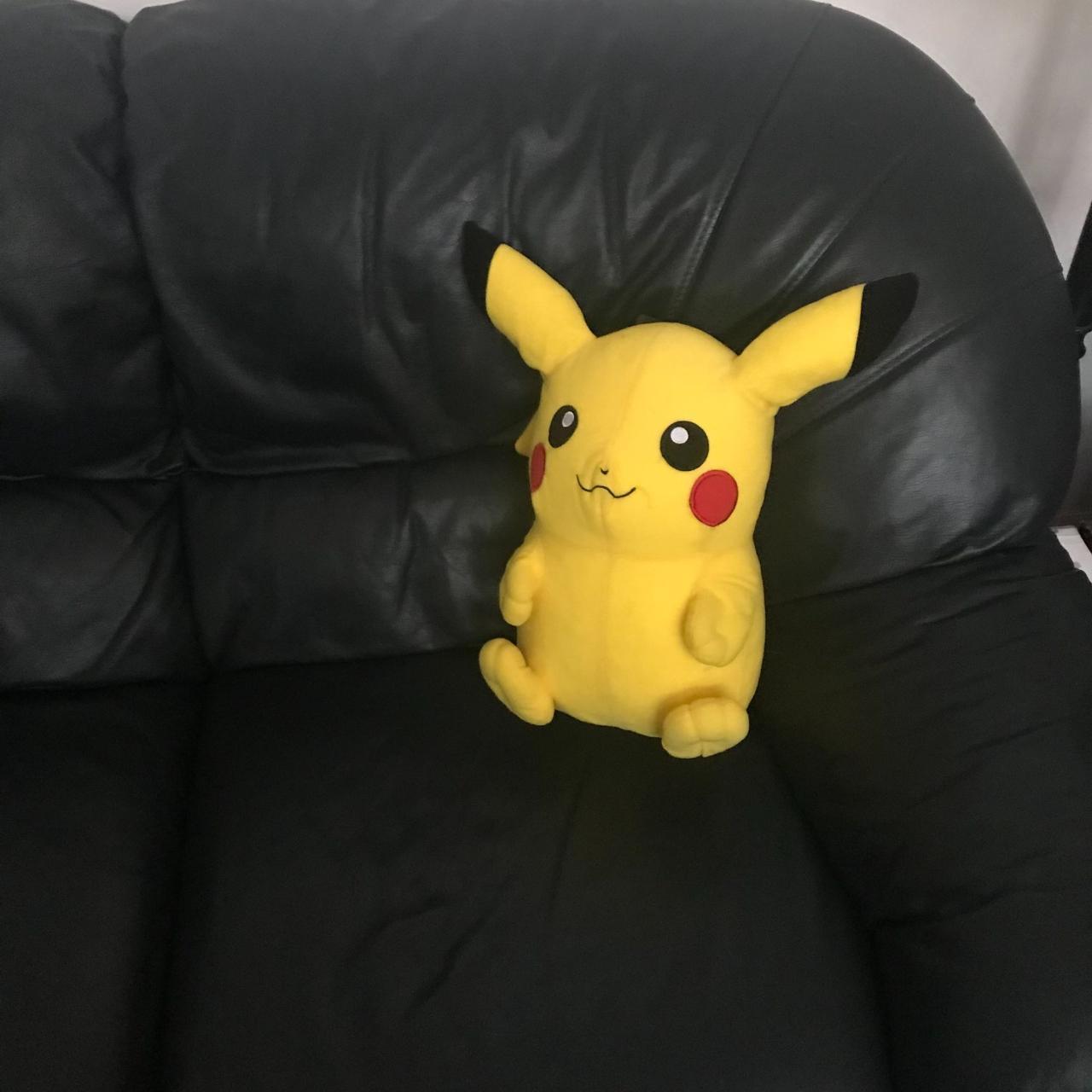 Giant pikachu plush sales dave and busters