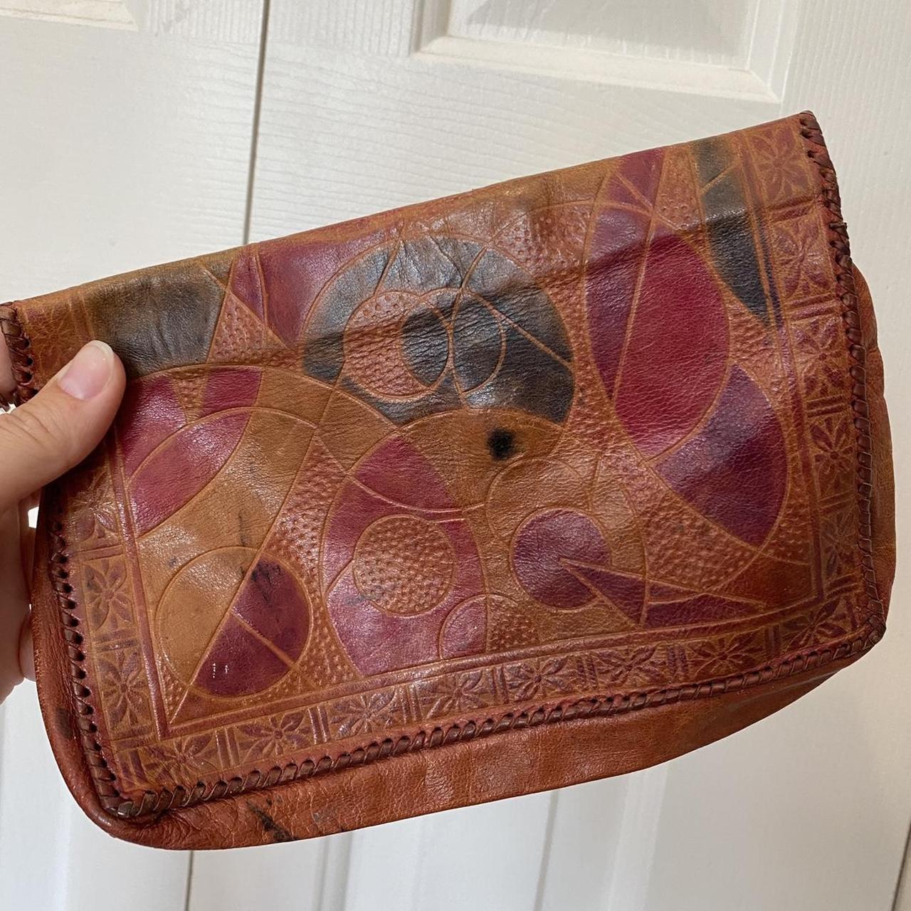 authentic gold distressed clutch labelled CLARE - Depop