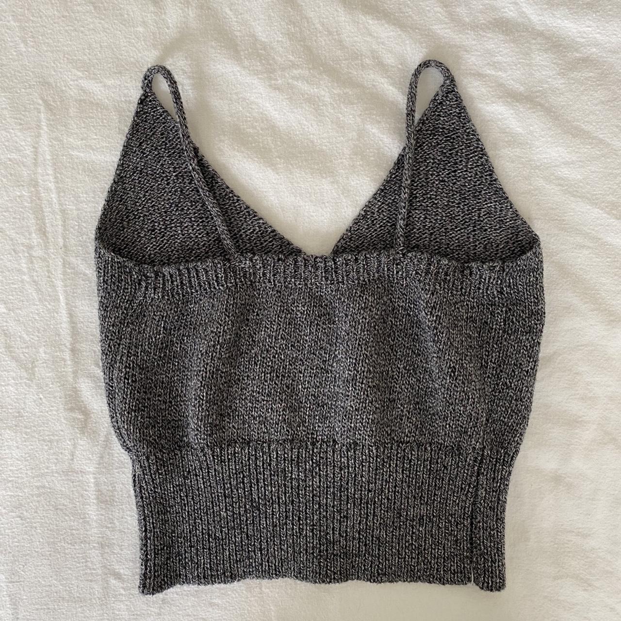 Grey knitted crop top from Brandy Melville. V neck... Depop