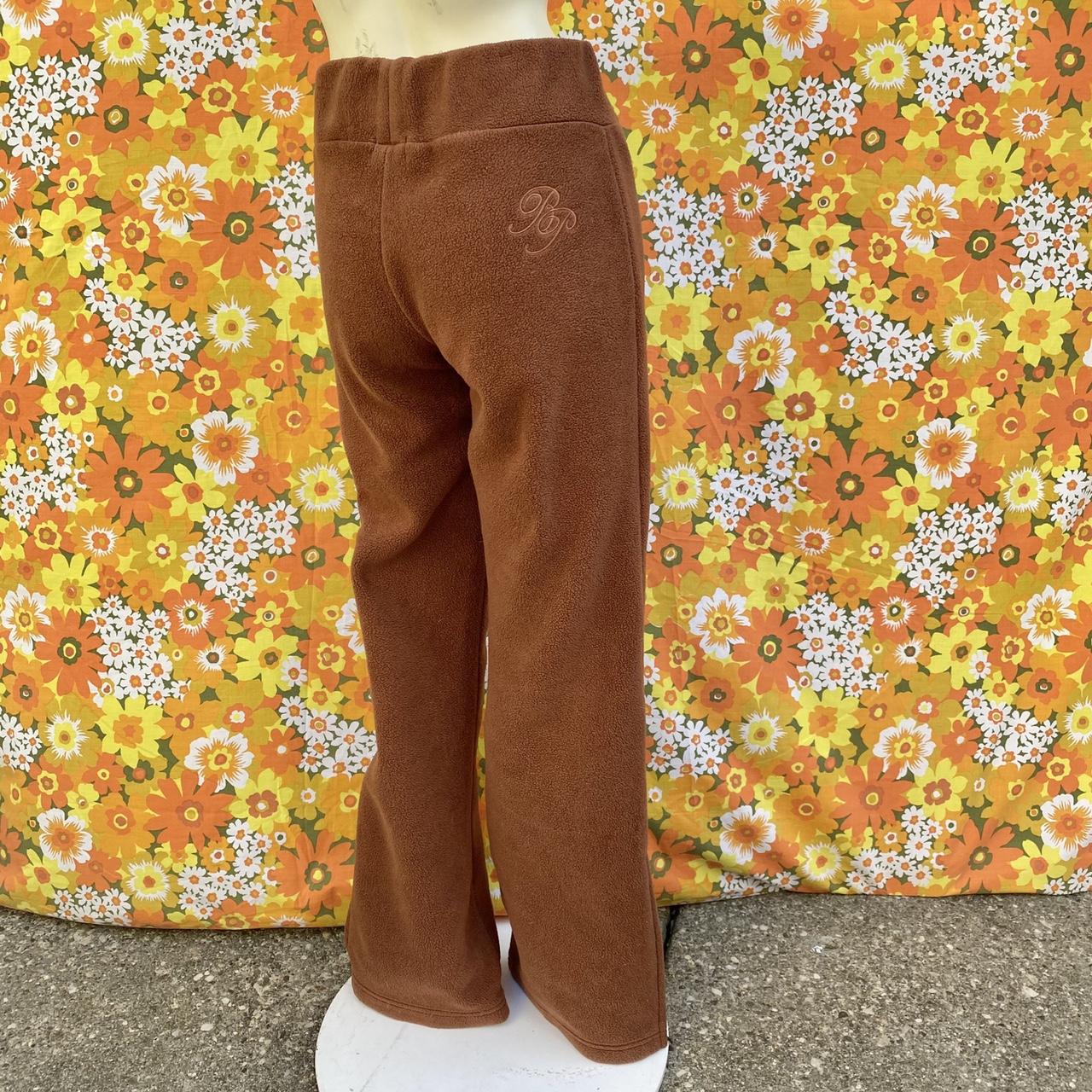 Vintage 00s baby phat sweatpants, mid rise, flares,... Depop