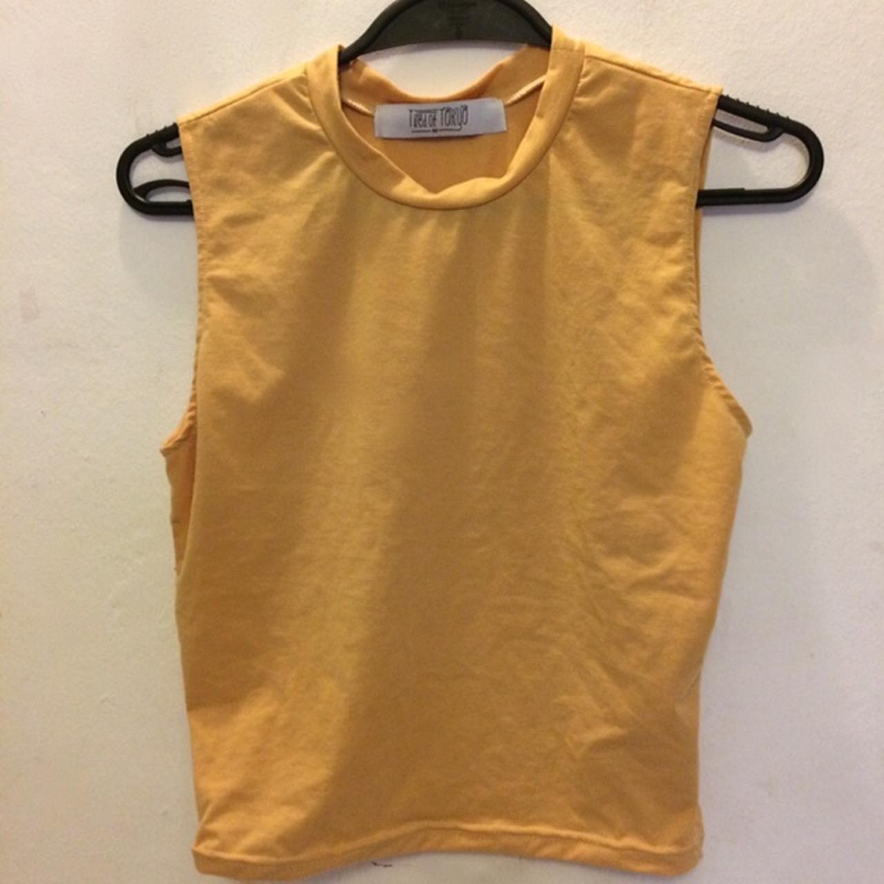 Really cute sleeveless yellow crop top! Depop
