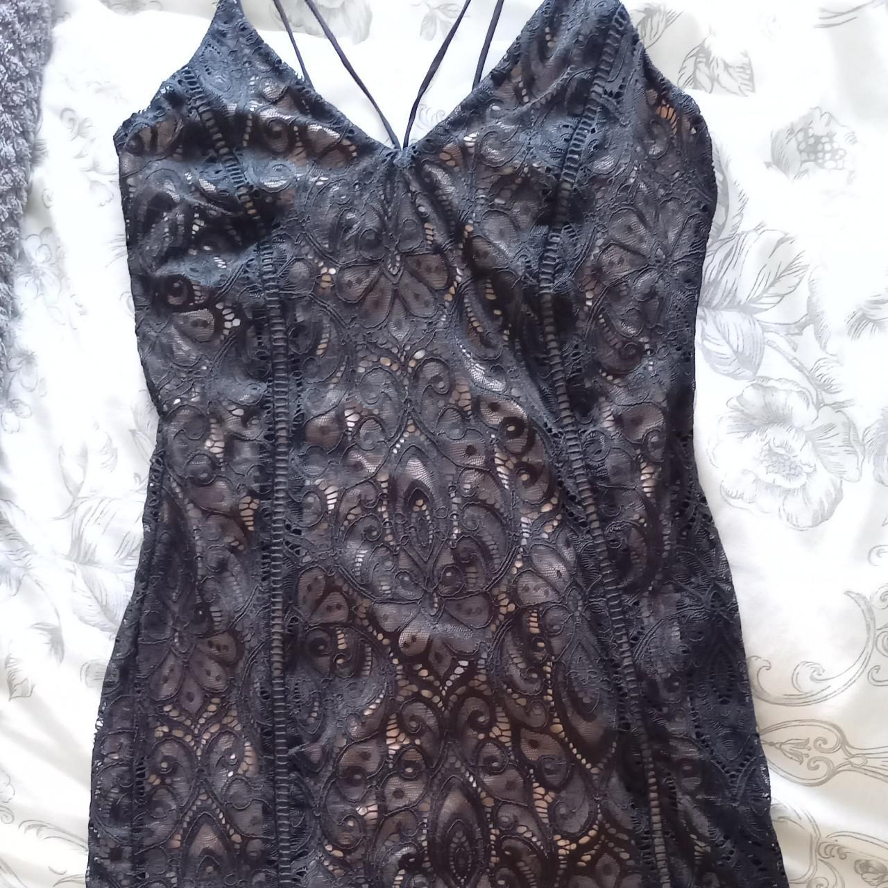 black lace dress with beige underlay