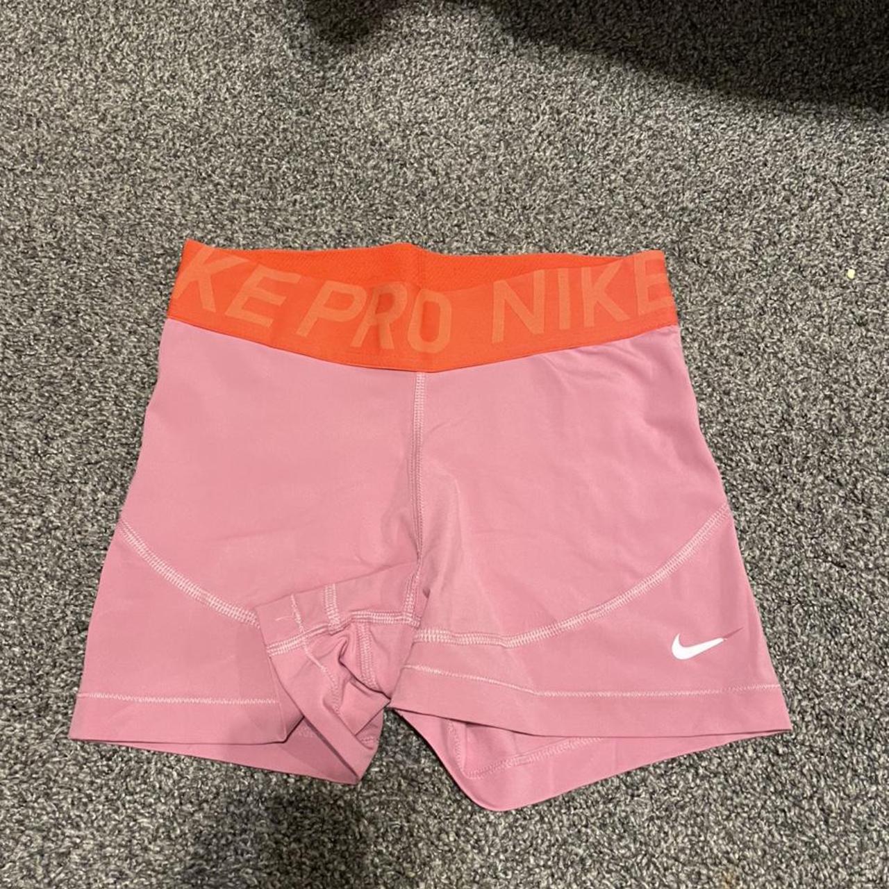 light pink nike pro shorts
