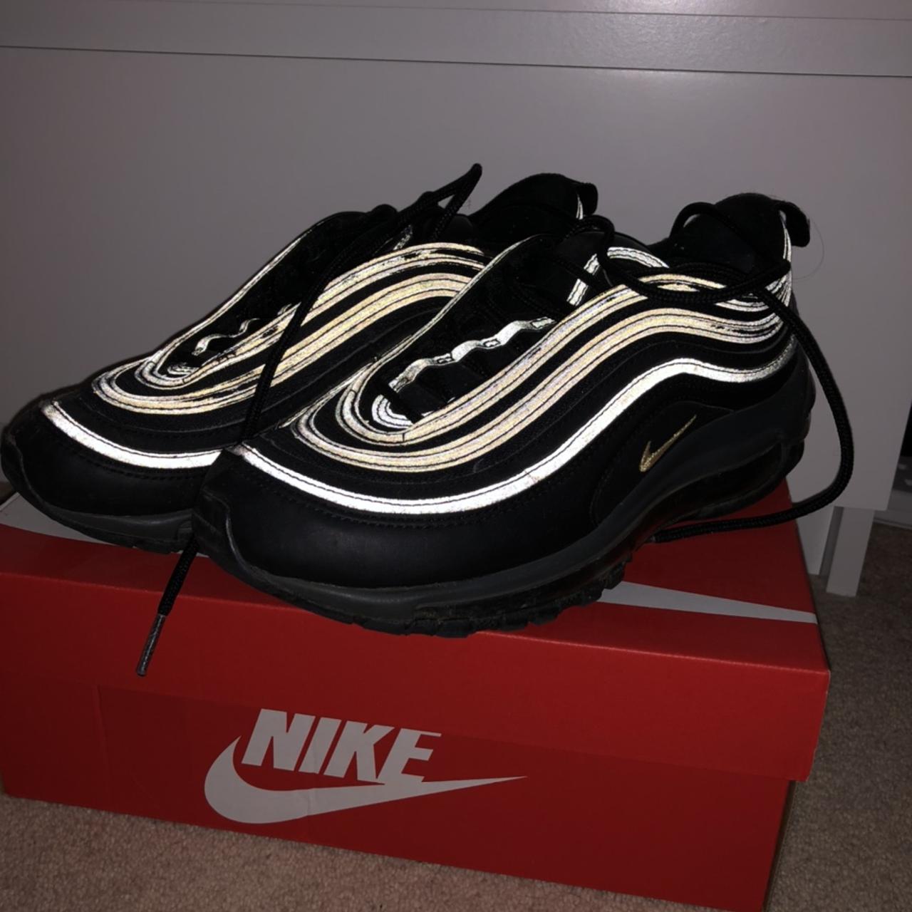 Black 97s hotsell with gold tick