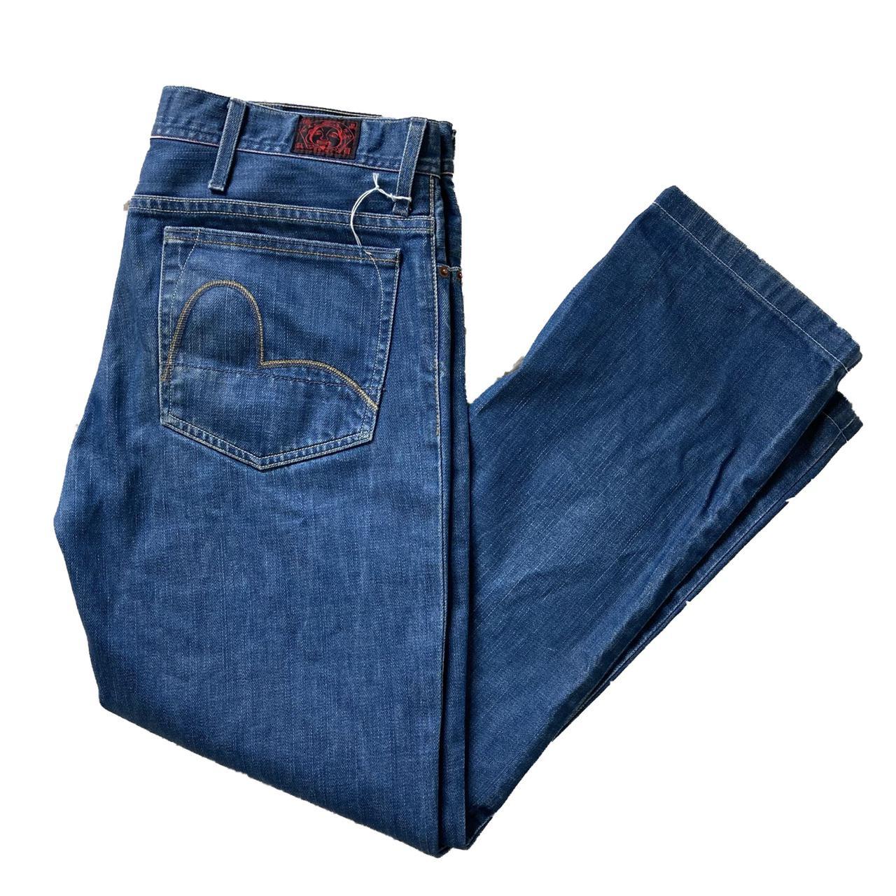 Evisu blue baggy jeans w embroidered logo on the... - Depop