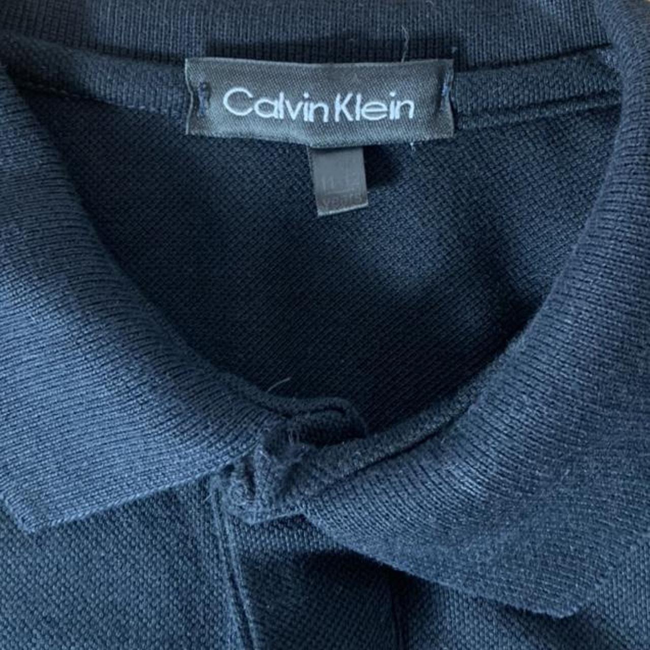 Calvin Klein Women's Black and White T-shirt | Depop