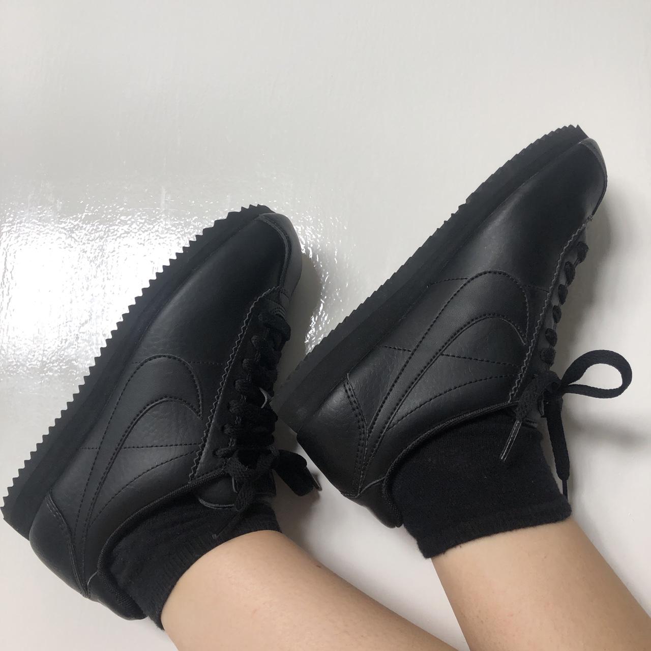 ladies black nike cortez