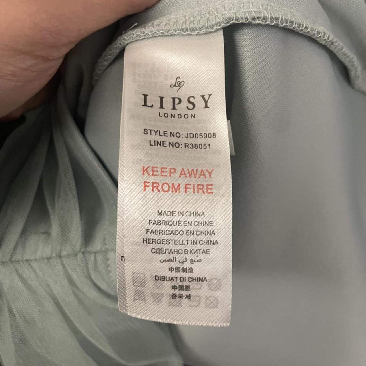 Stunning Lipsy Mint Coloured Ruffle Dress. Zip... Depop