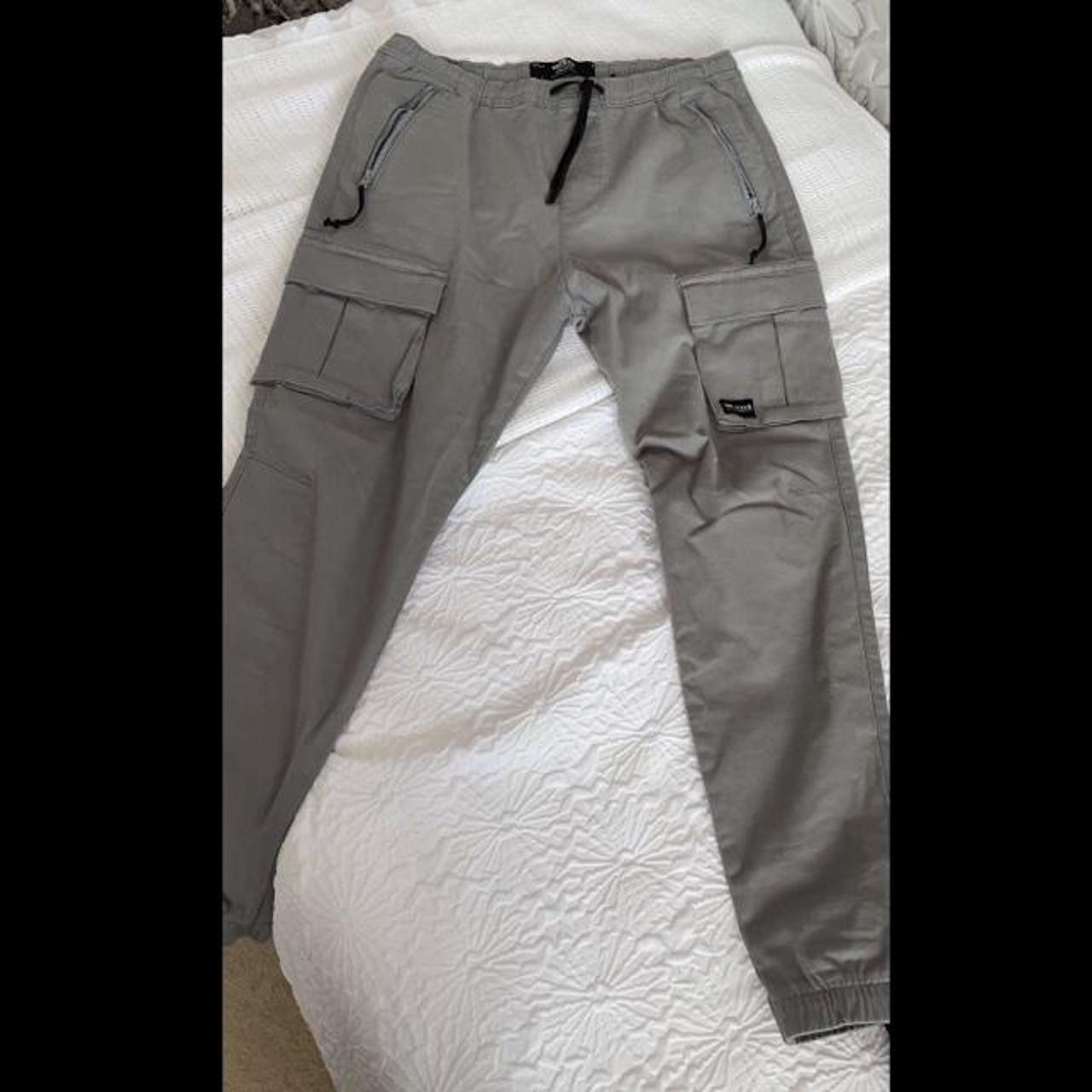 Hollister cargo pants, worn once but too small,... Depop