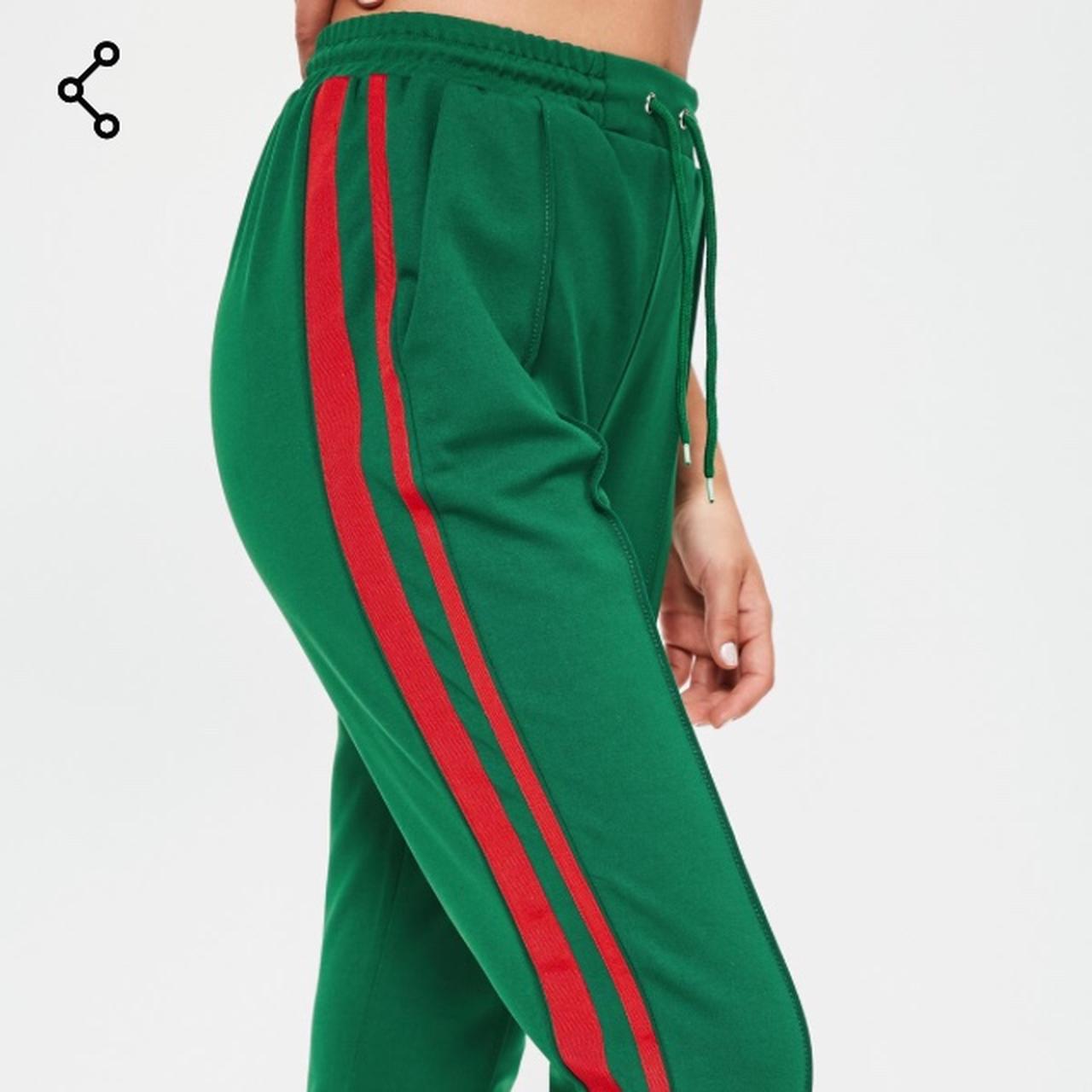 Green joggers sale with red stripe