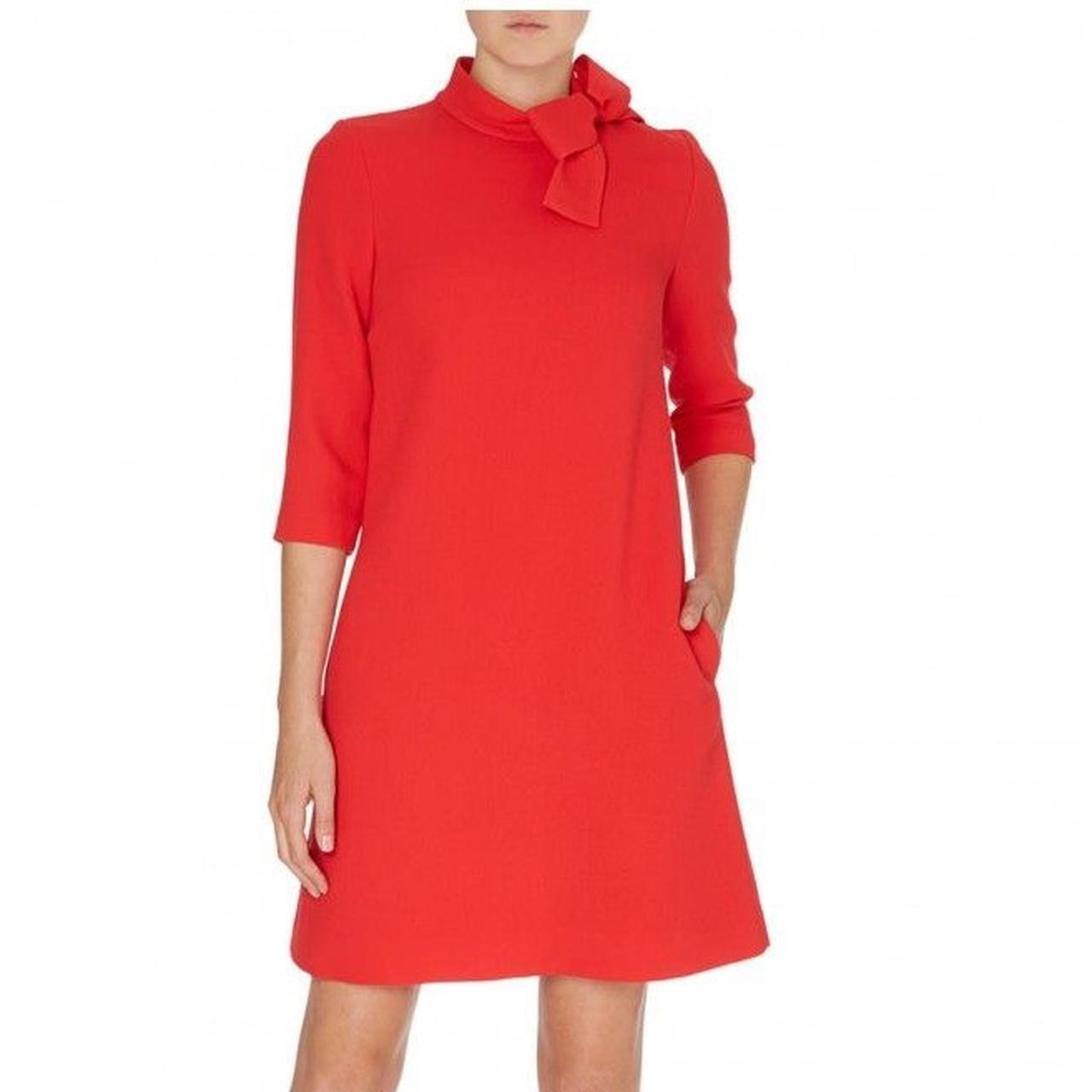 designer Red Goat dress with high neck and bow