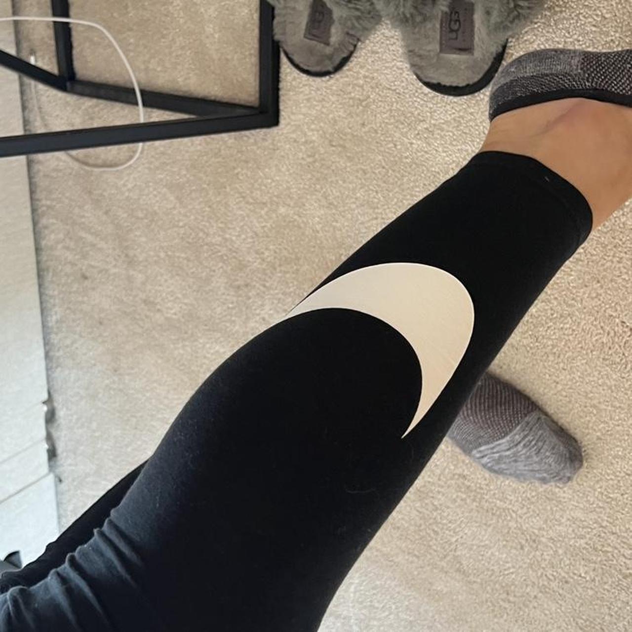 nike leggings with tick on thigh
