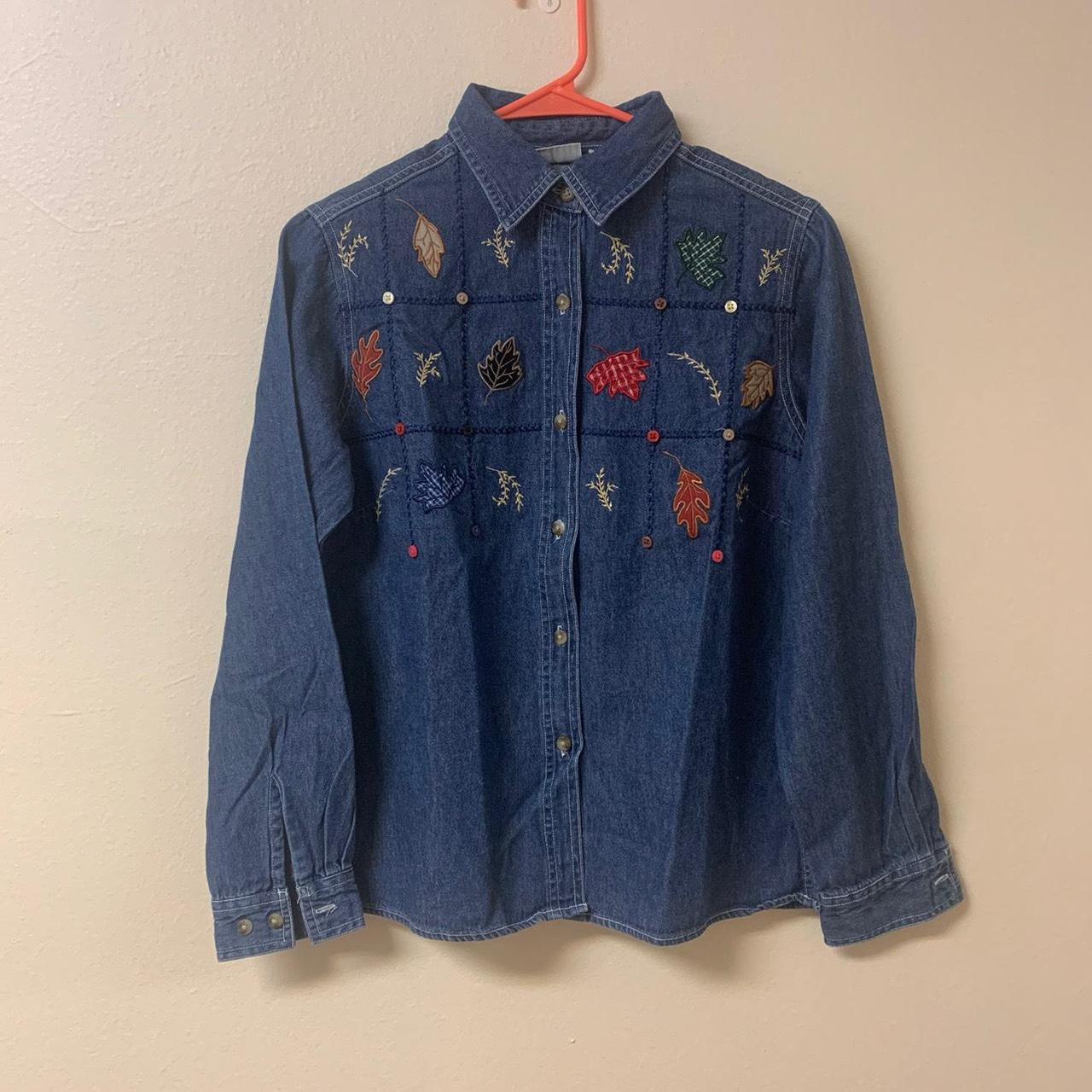 this is a dark blue denim button up with autumn leaf... - Depop