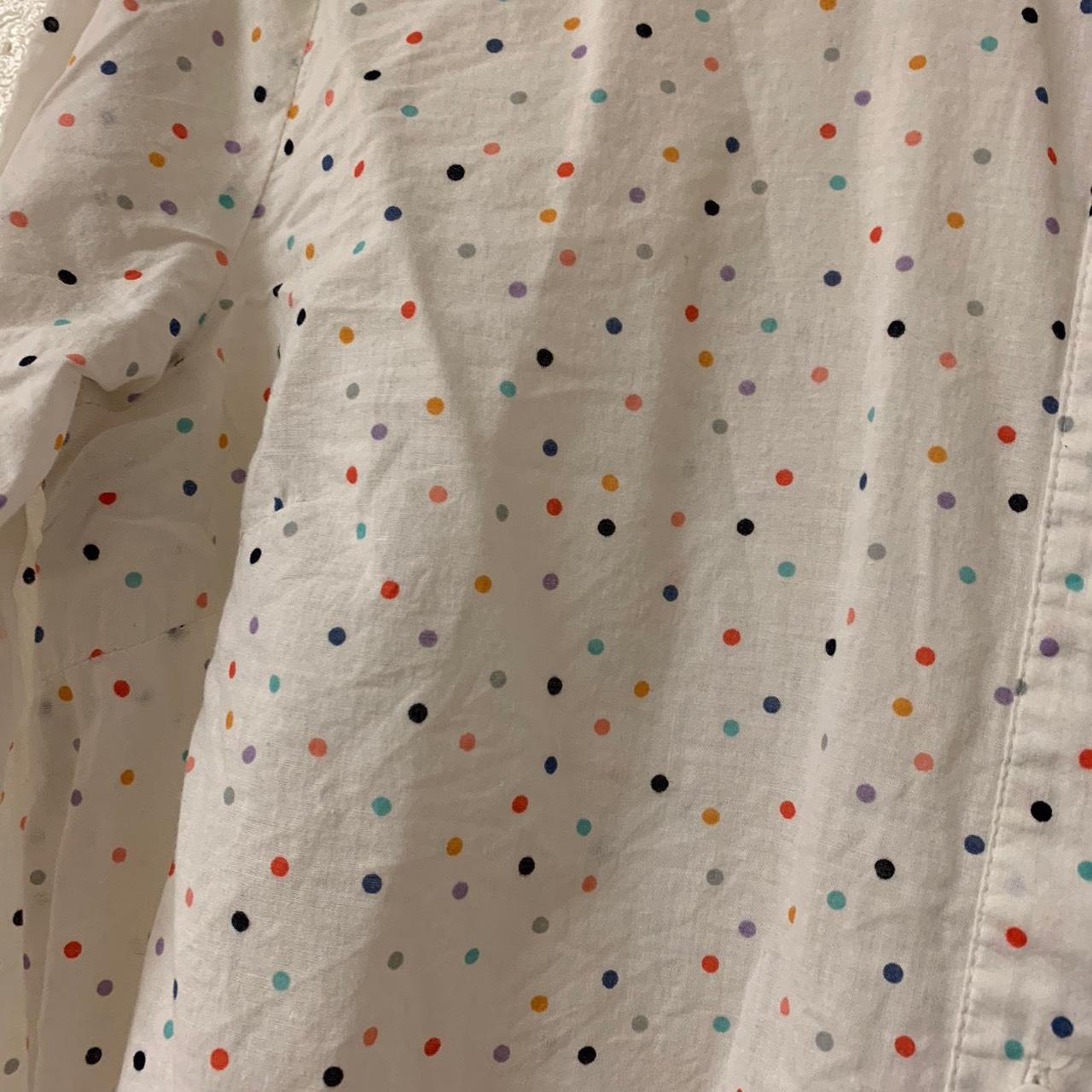 this is a white polka dot button up FITS THESE... - Depop