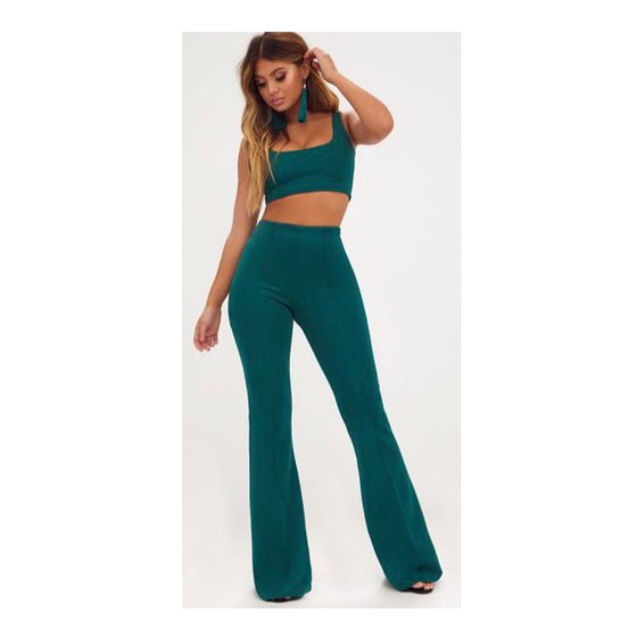 Green high waisted flare trousers. Never been worn... Depop