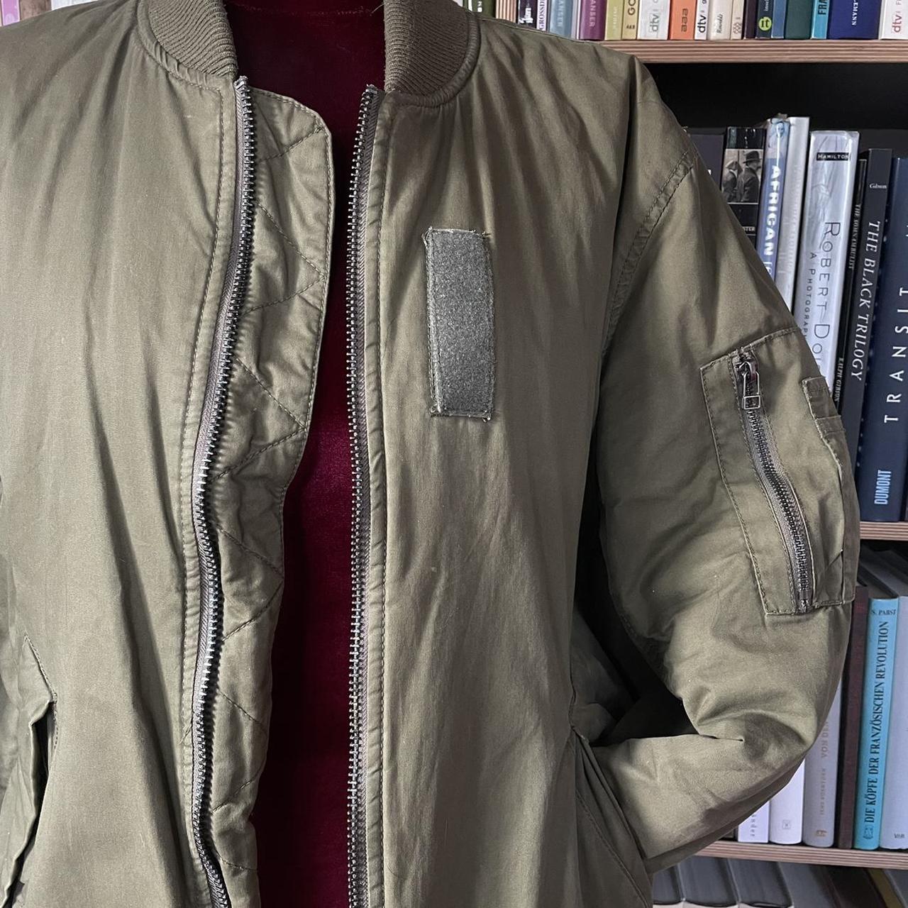 olive green bomber jacket with orange lining Please... - Depop