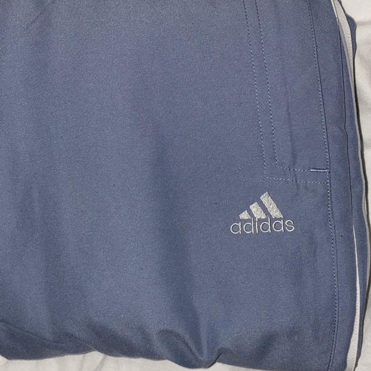 blue adidas tracksuit with zips and elasticated... - Depop