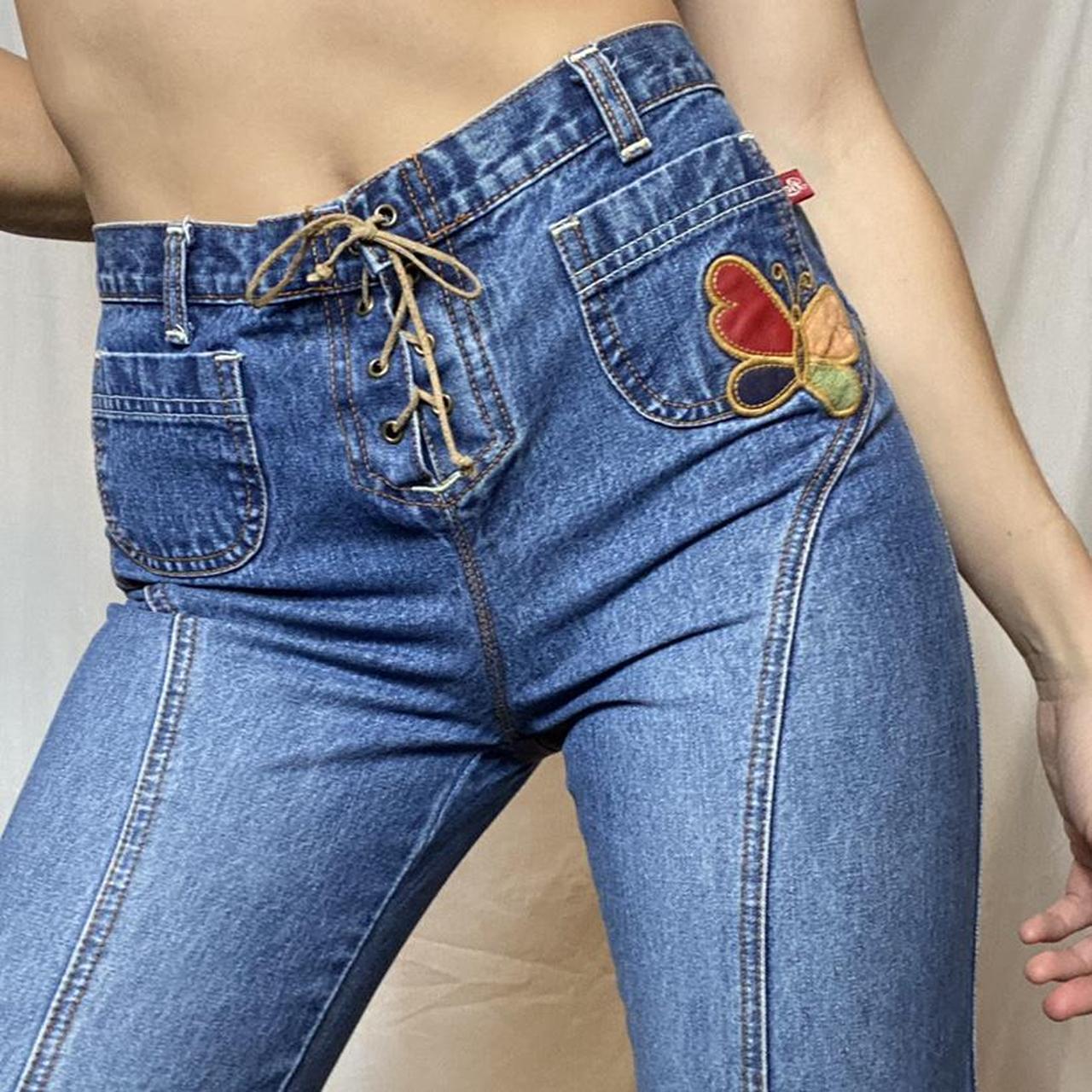 Aghhh the most beautiful lace up butterfly jeans.... Depop