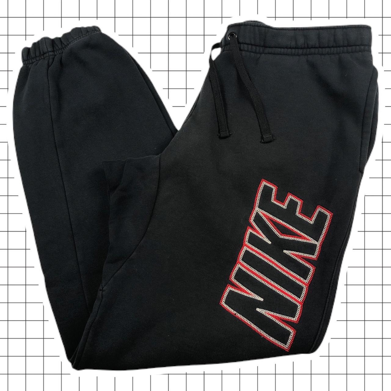 nike club joggers black red