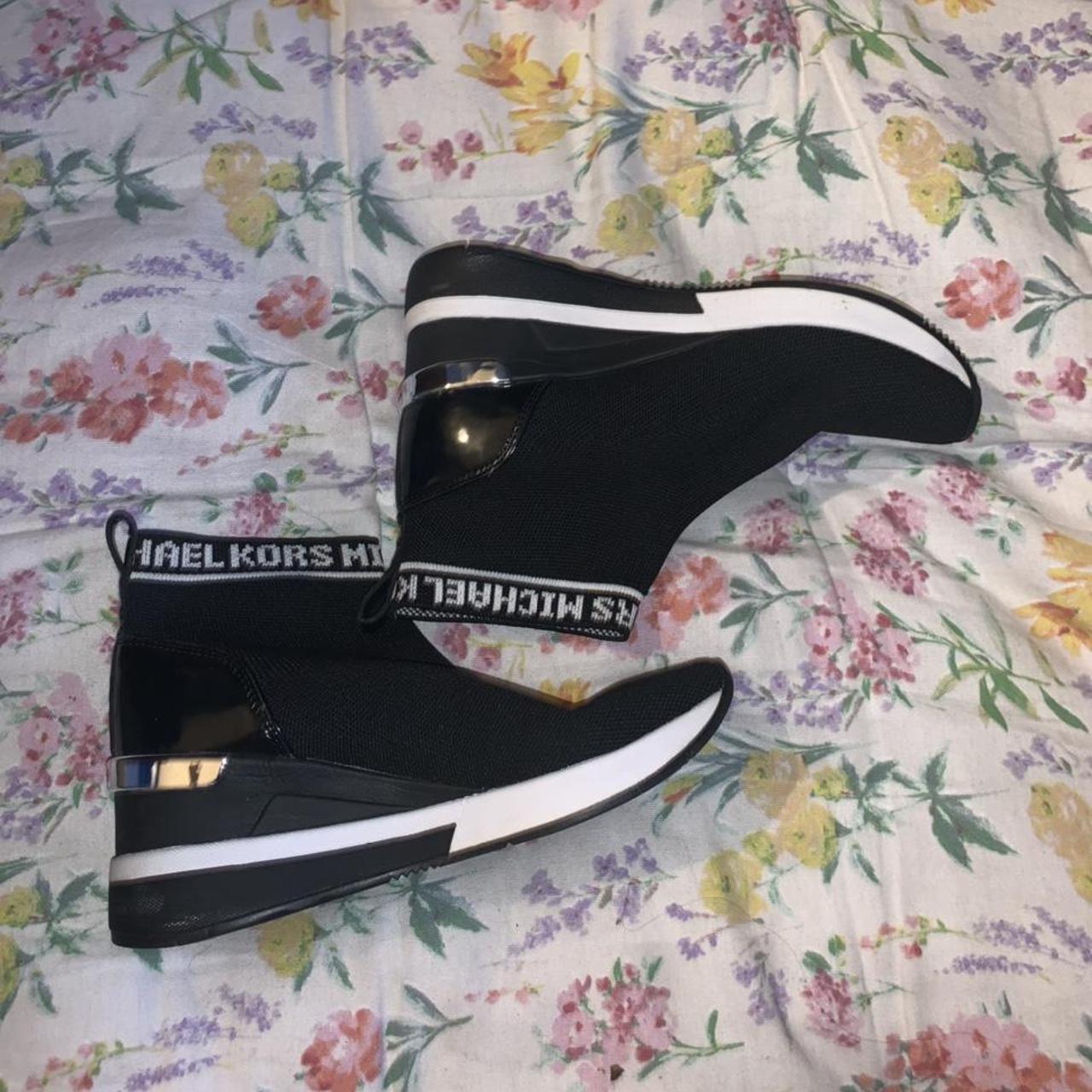 Michael Kors Women's Black and White Trainers | Depop