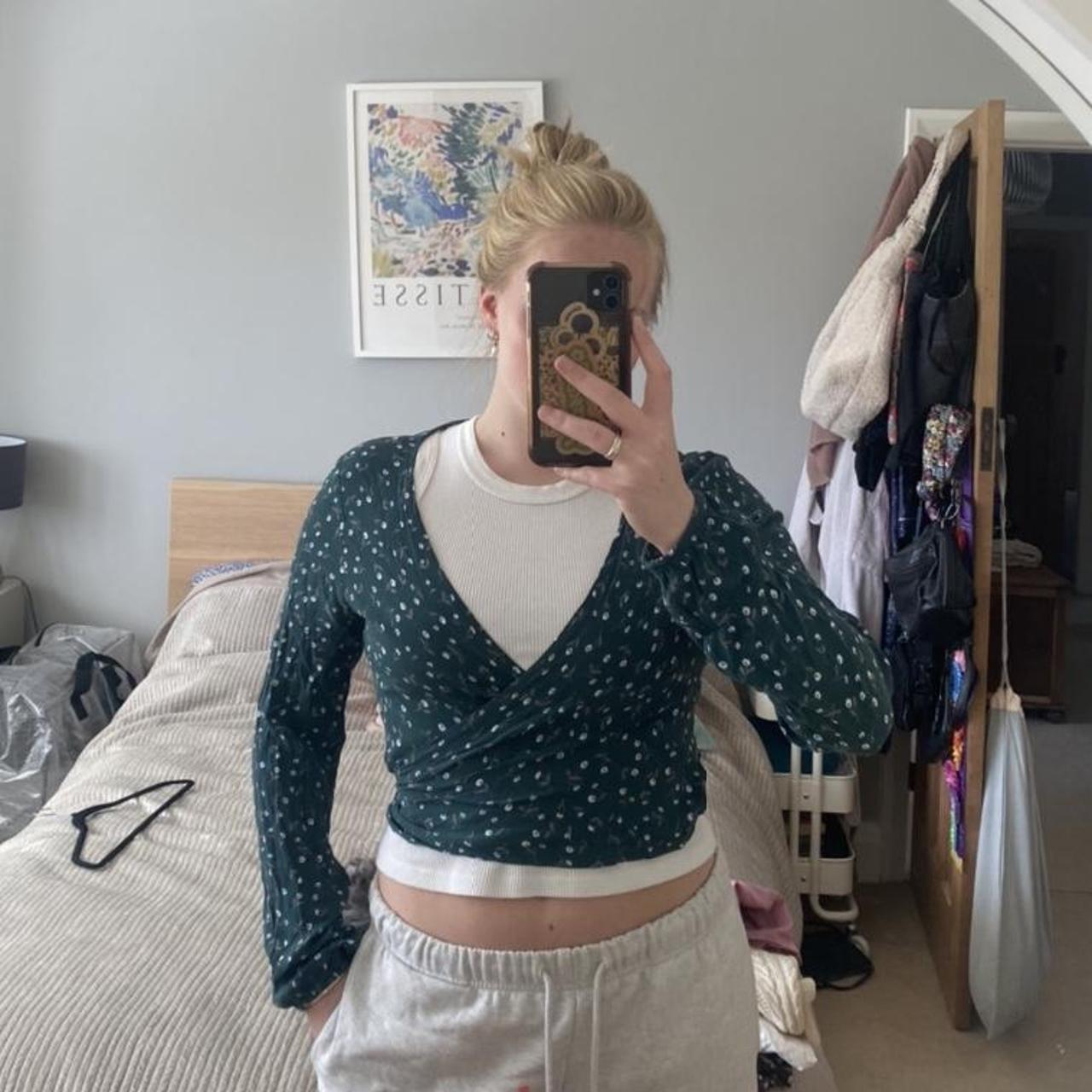 Brandy melville wrap top. Love this just don’t get... Depop