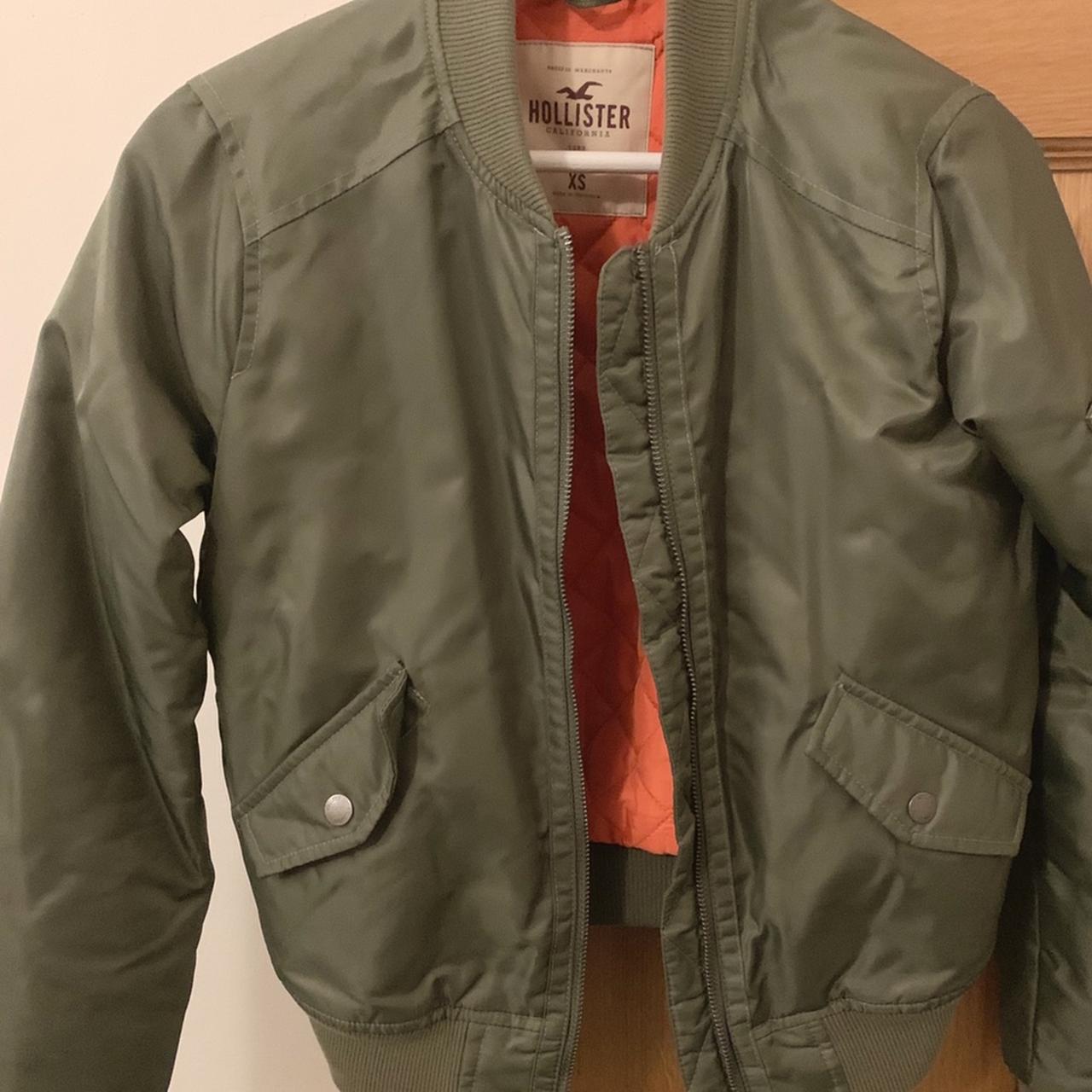 Hollister bomber jacket Green with orange lining... - Depop