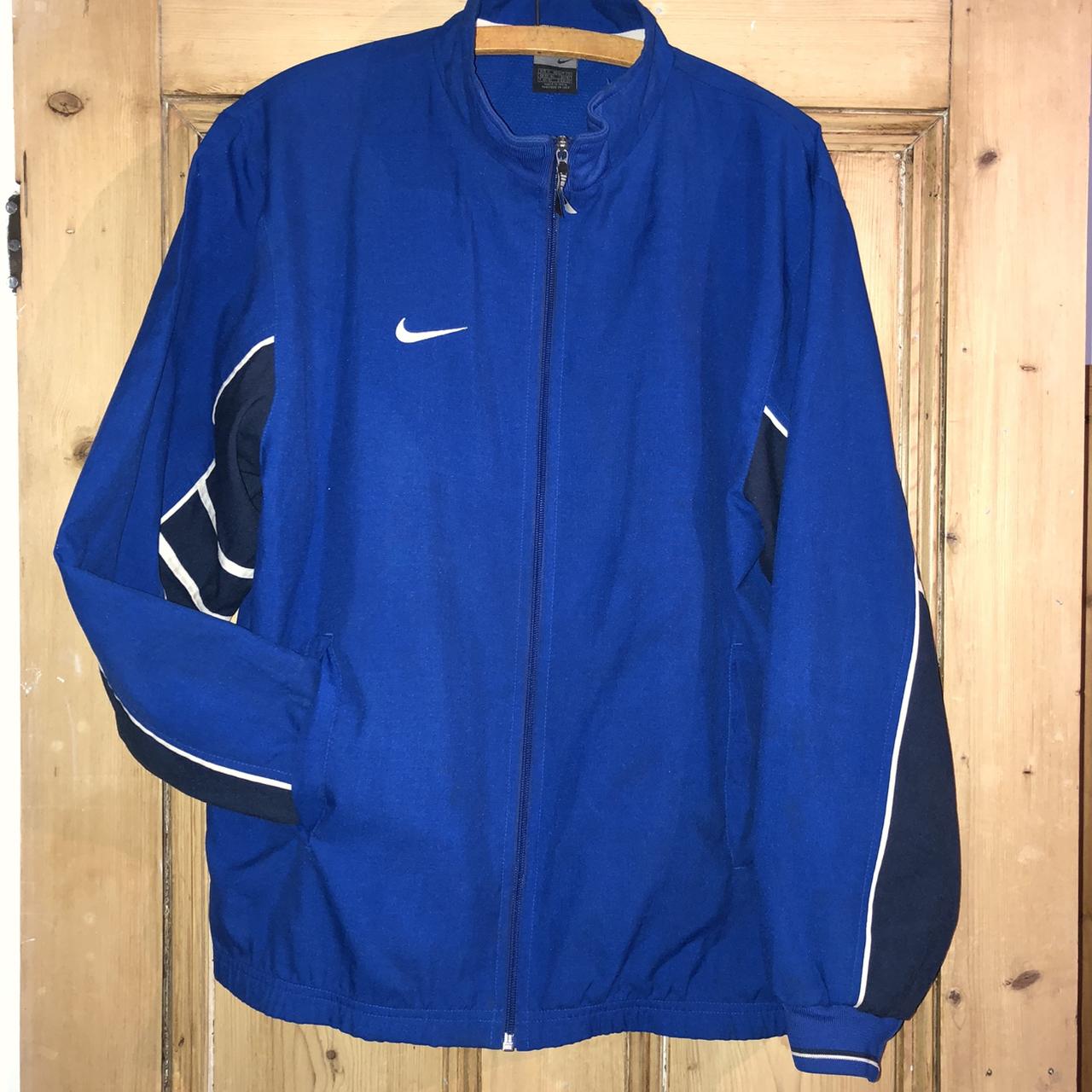 Nike blue retro sports jacket, in good condition,... - Depop