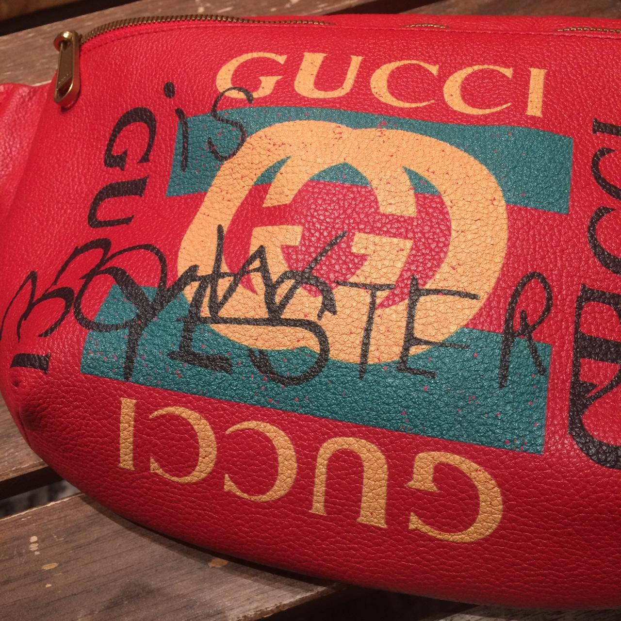 Gucci tomorrow red leather pouch has been worn Depop