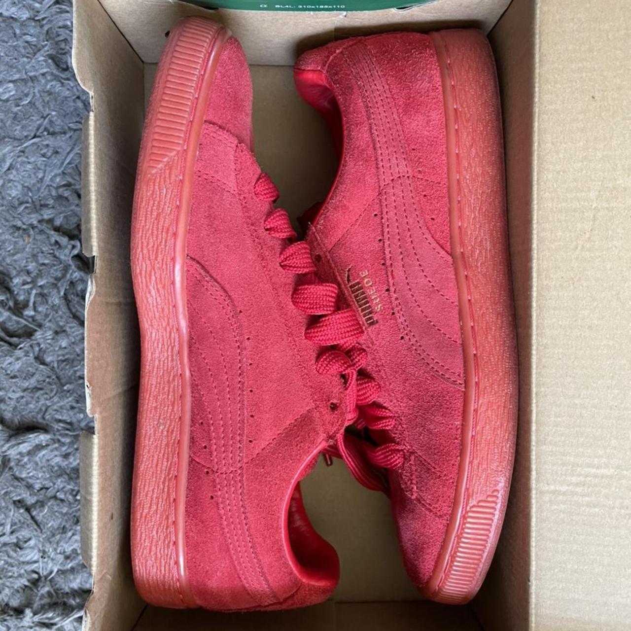 All pink store suede pumas