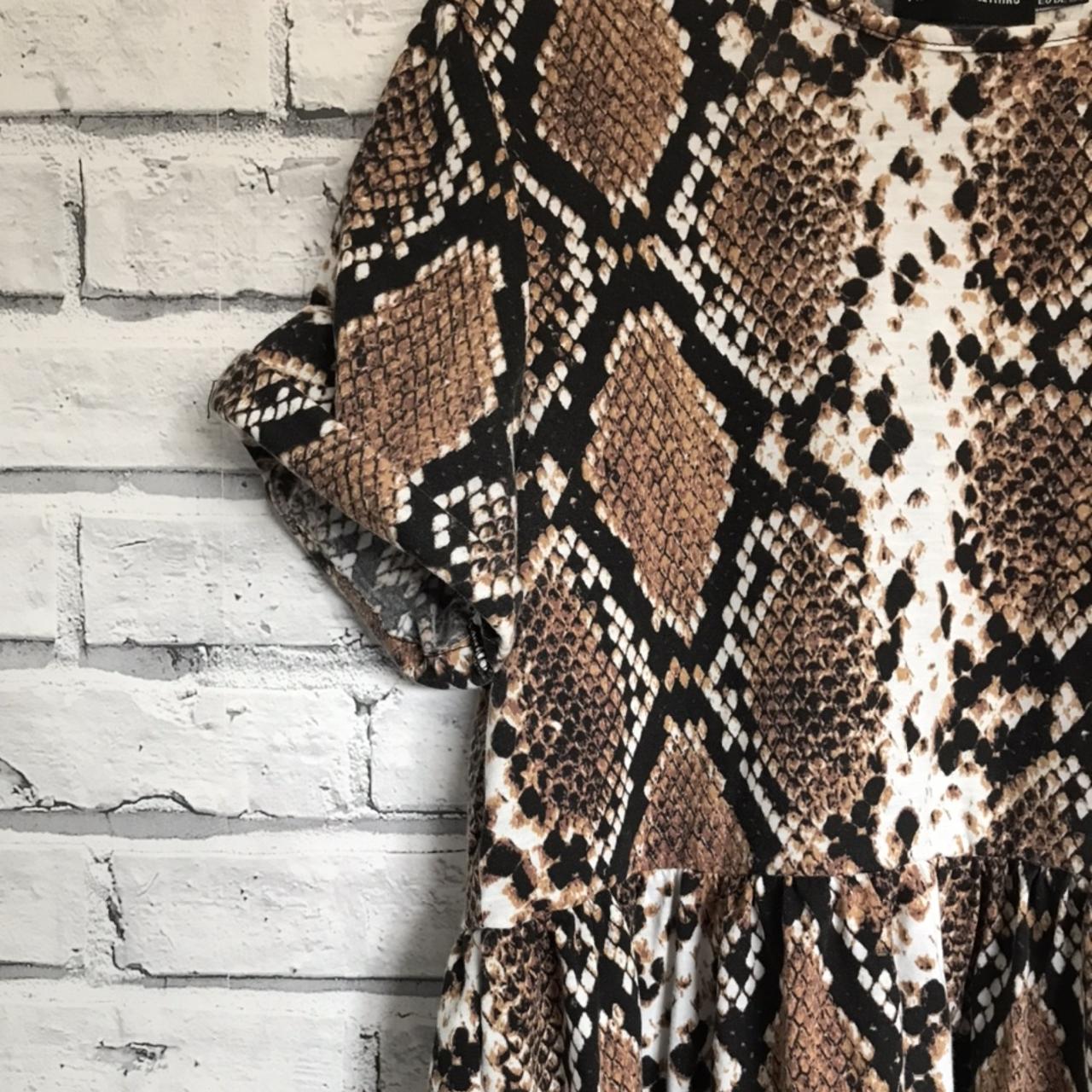 Brown snake print smock dress Pretty little... - Depop