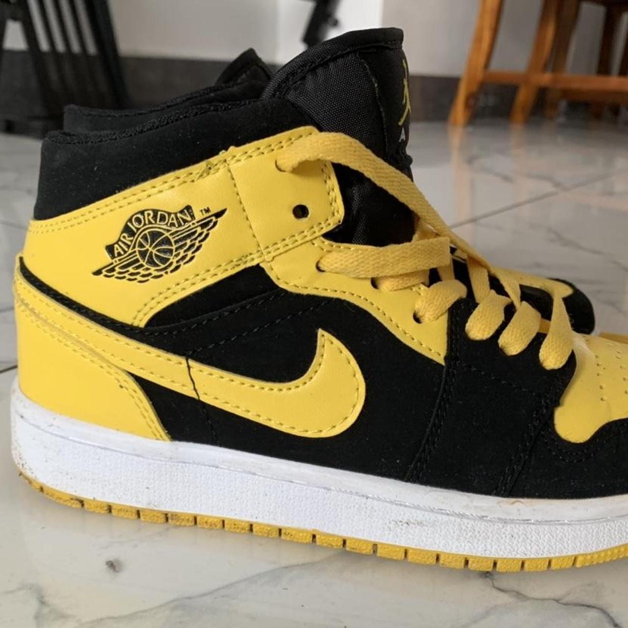 Air Jordan mids in yellow and black colour-way