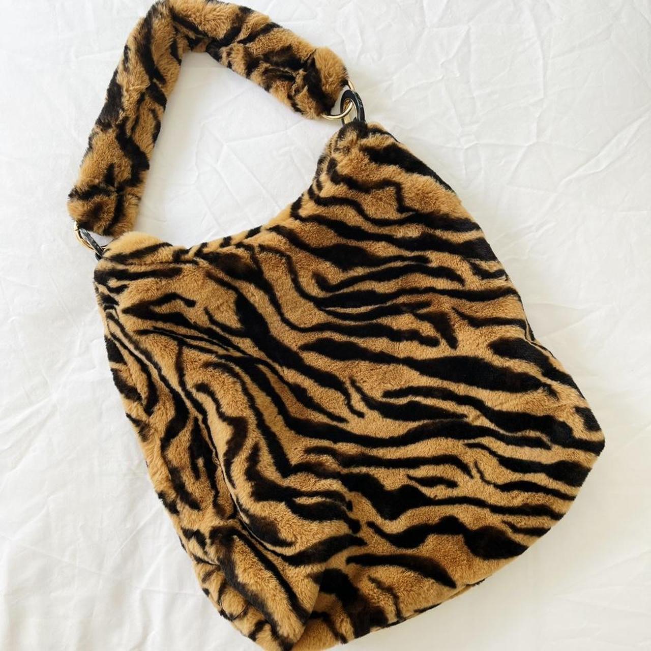 Fern tiger print faux fur shoulder hobo... Depop