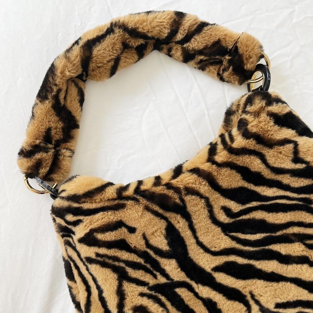 Fern tiger print faux fur shoulder hobo... Depop