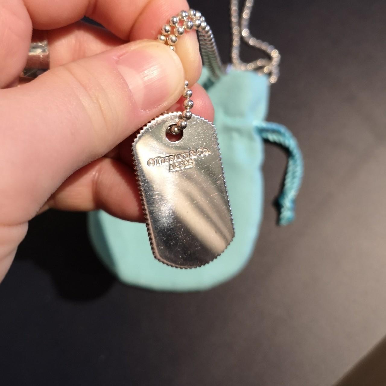 Coin edge outlet tag pendant