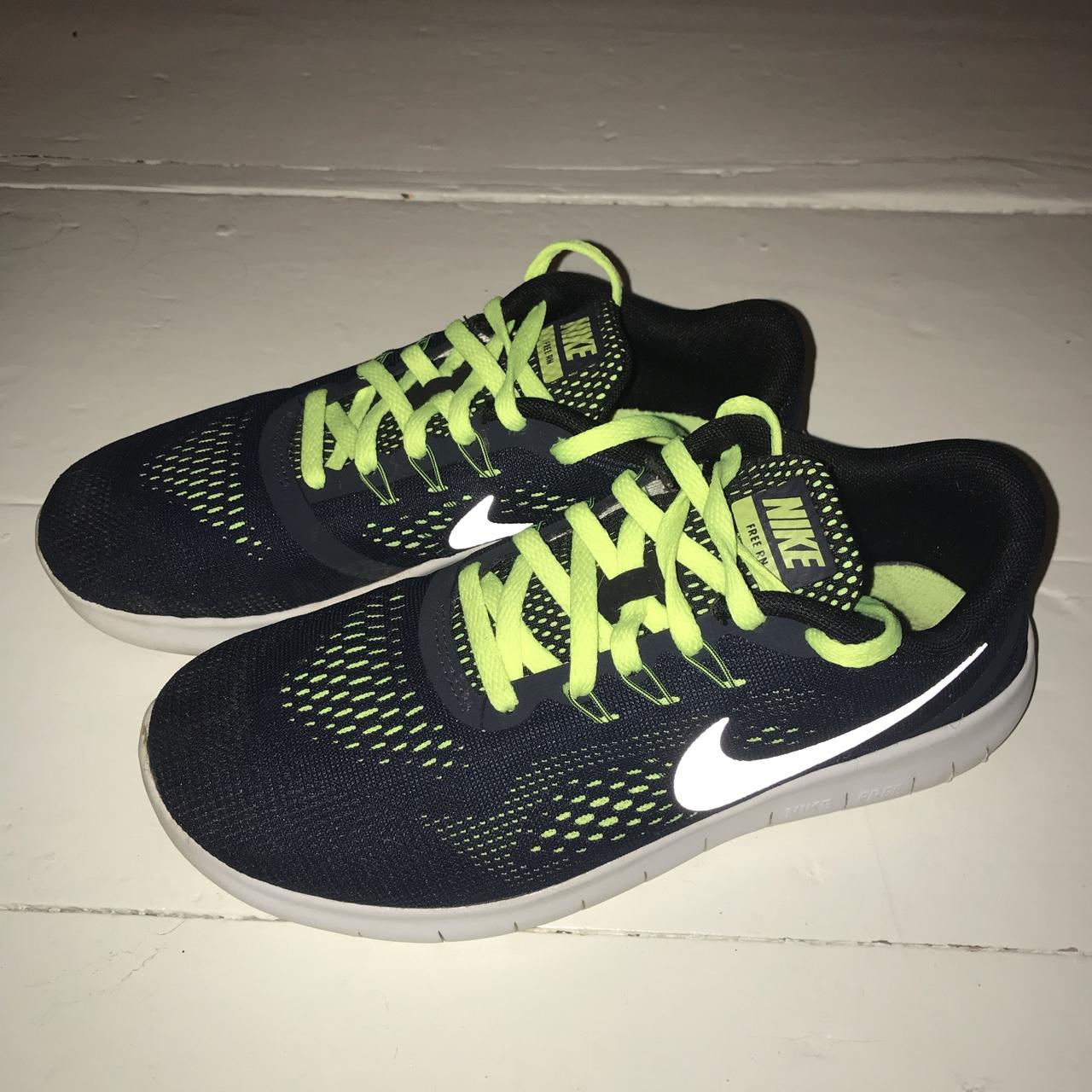 Nike Free Runs, worn once! Navy blue and neon yellow... - Depop