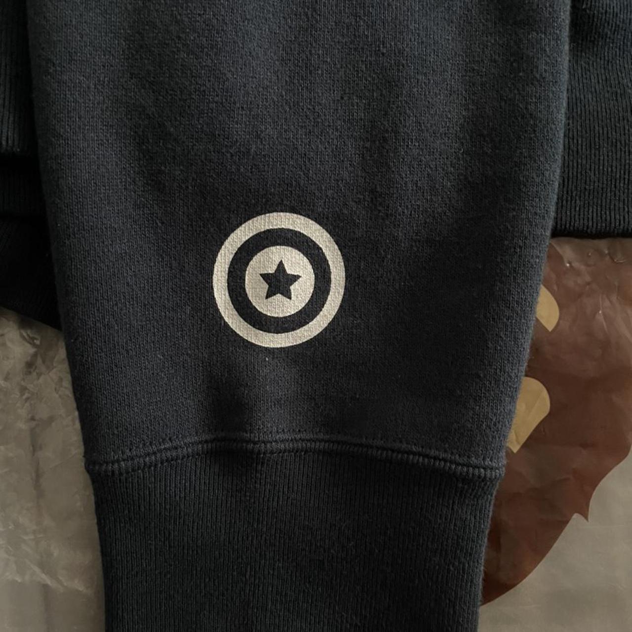 Close-Up Shot of a Person Wearing Bape Shark Hoodie · Free Stock Photo