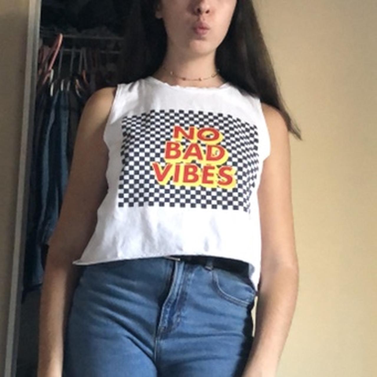 Cropped White women’s muscle tee. Has the checked... - Depop