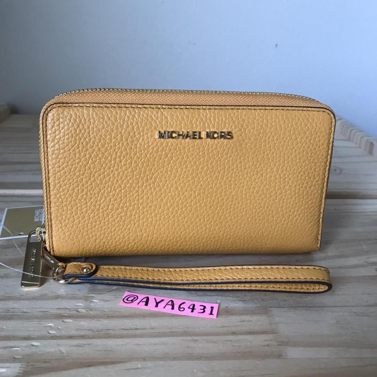 Red micheal kors wallet with wristlet with gold - Depop