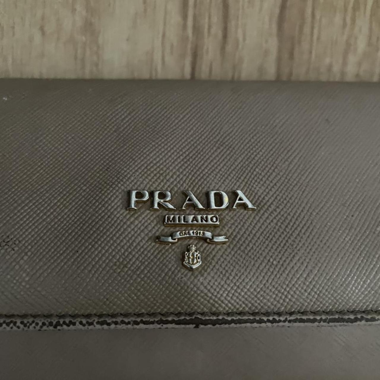 prada wallet nude