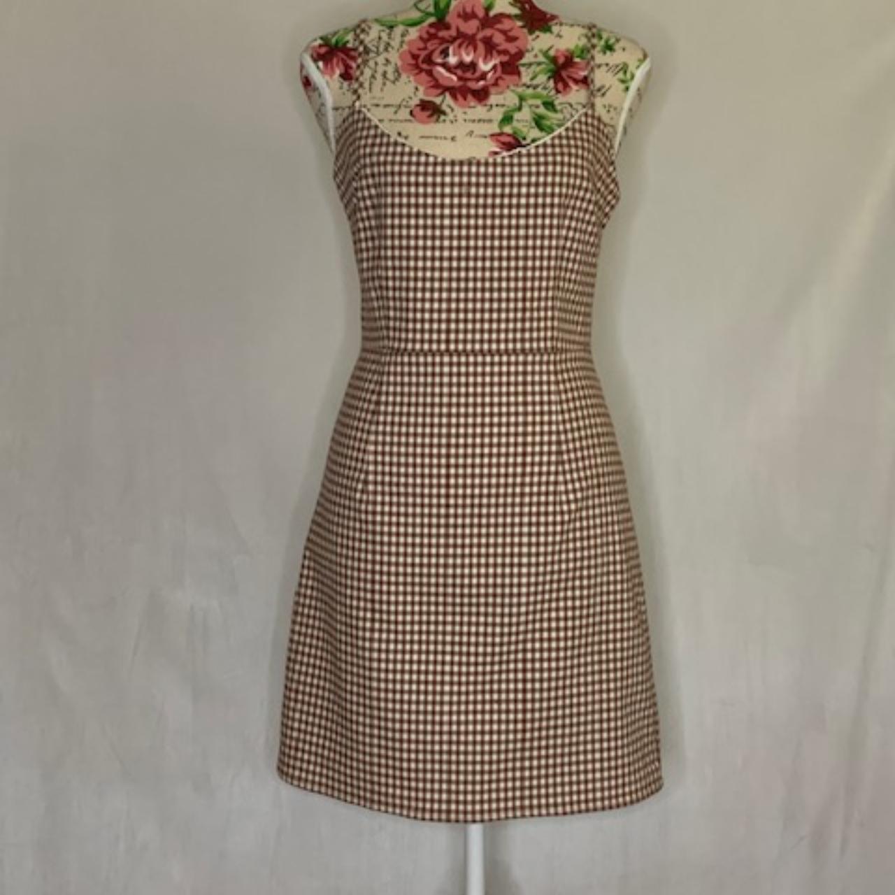 Brown gingham dress with white lacey detail on the... - Depop