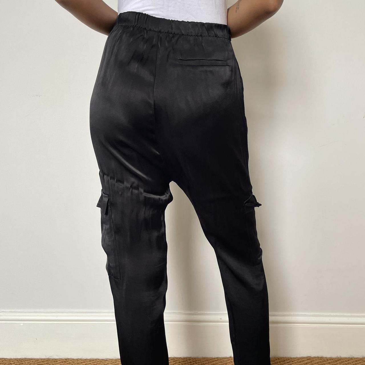 Black satin cargo pants with tie up detail from... Depop