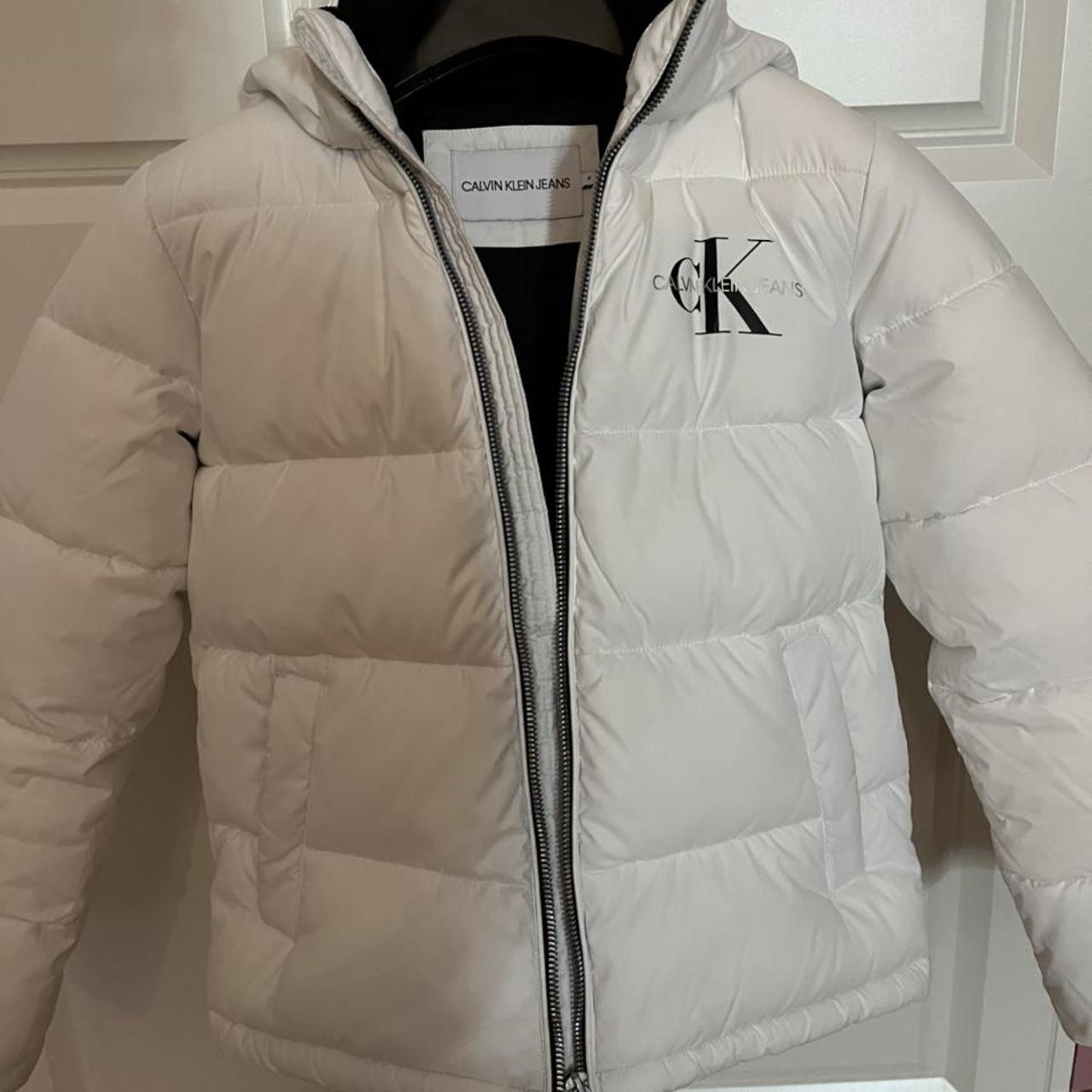 White Calvin Klein puffer jacket // Never worn so in... Depop