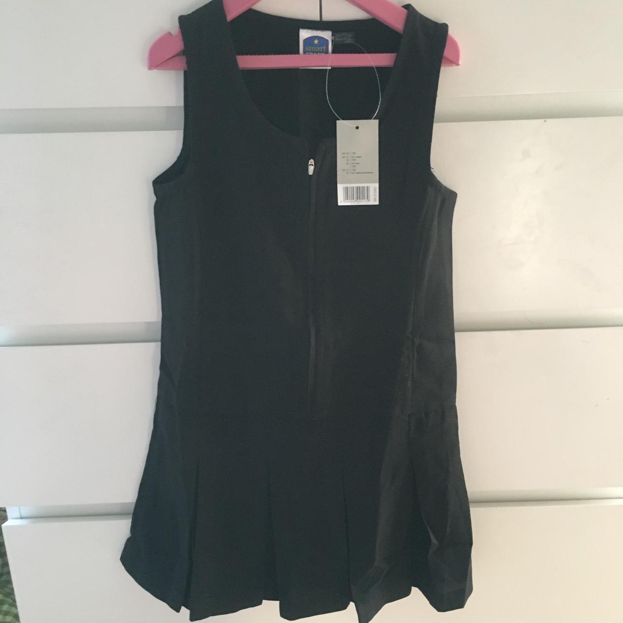 Brand new black girls school pinafore dress. Water... - Depop