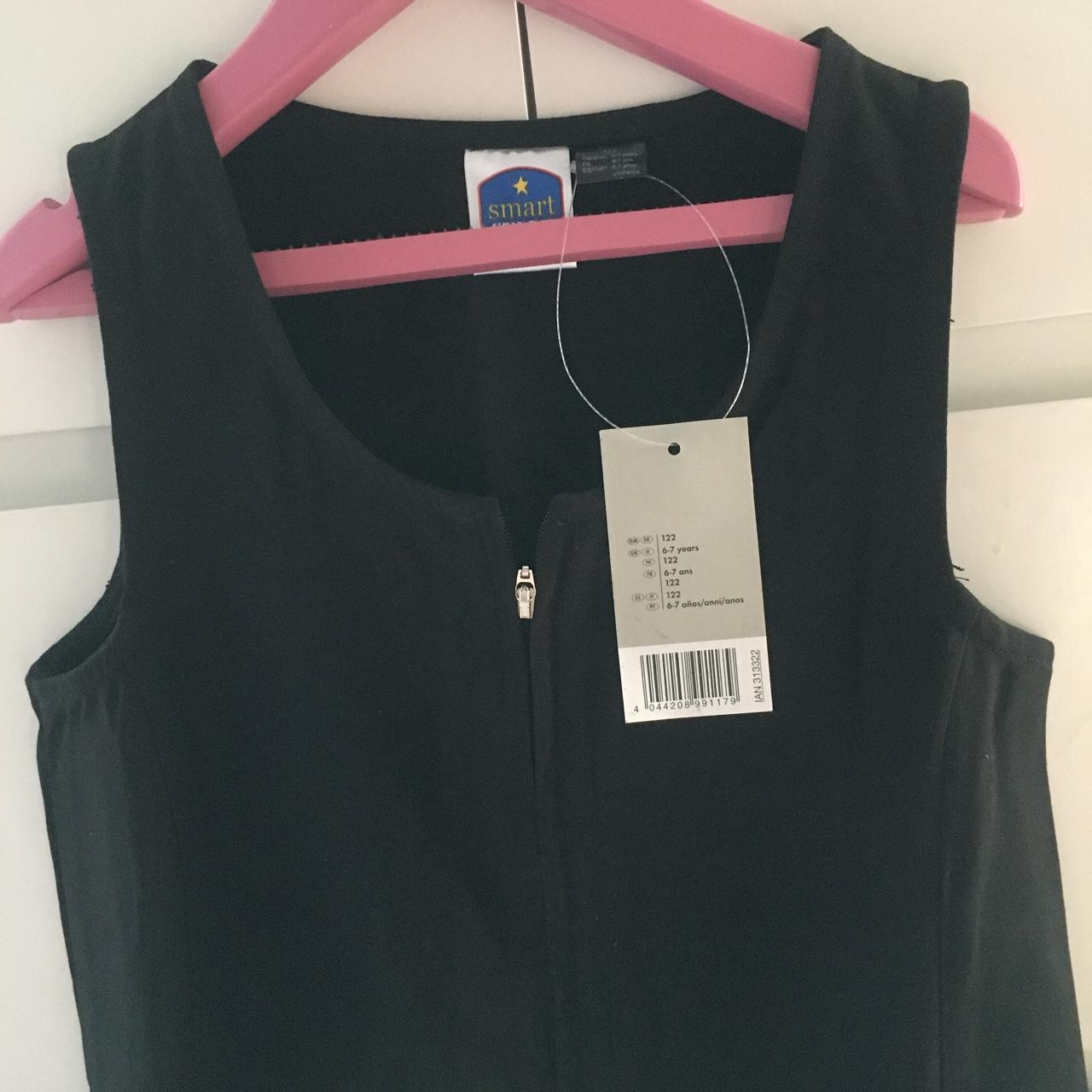 Brand new black girls school pinafore dress. Water... - Depop