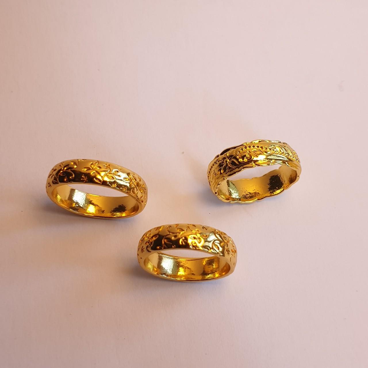 Gold coloured engraved rings in size O and... Depop