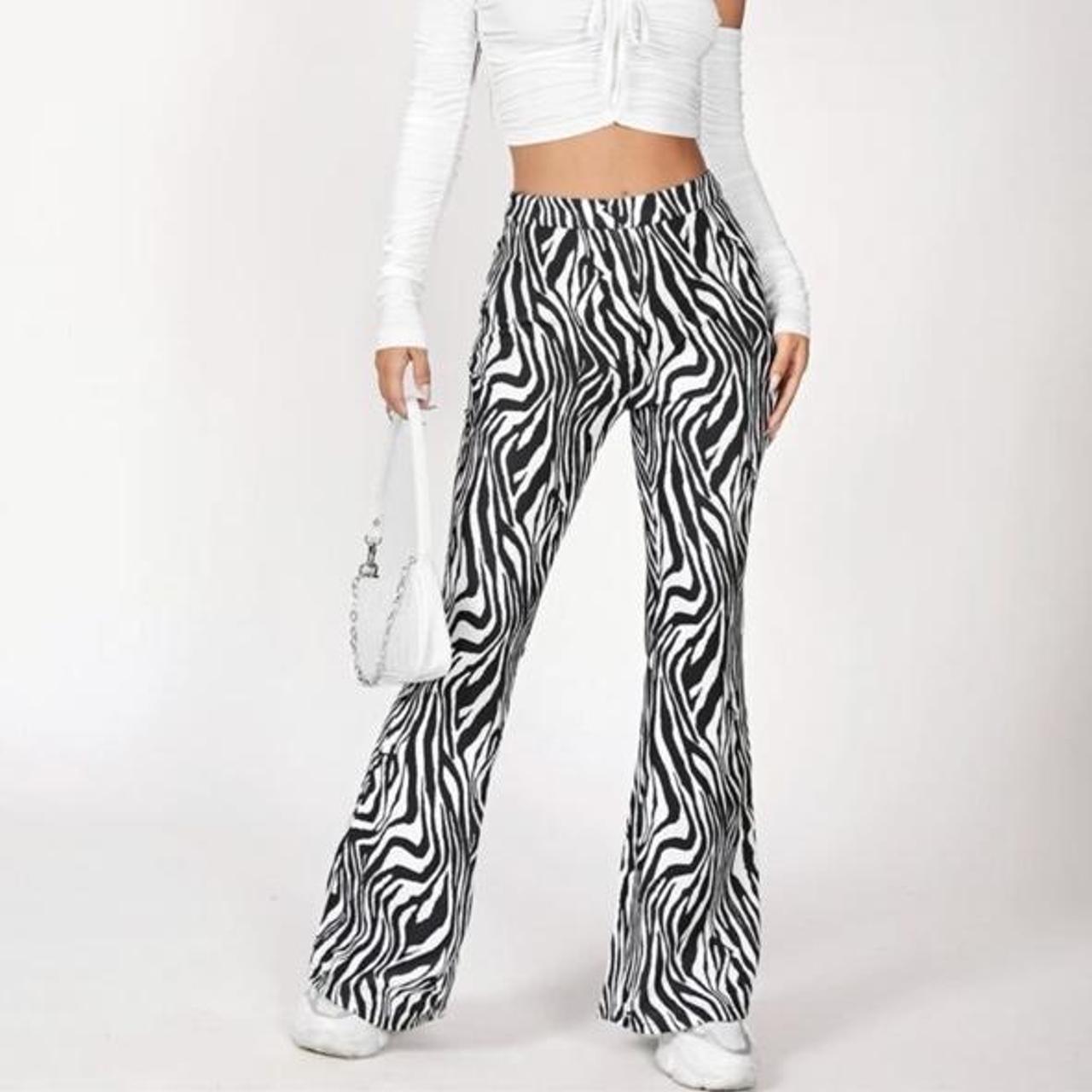 Zebra flare pants Would fit a 4-6 #yogapants #flare... - Depop